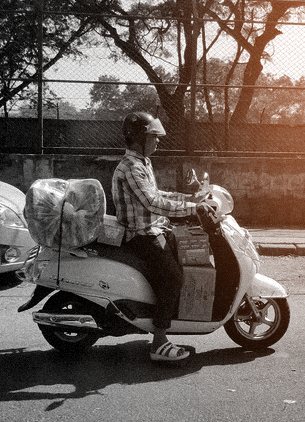 A Zorit rider on a scooter